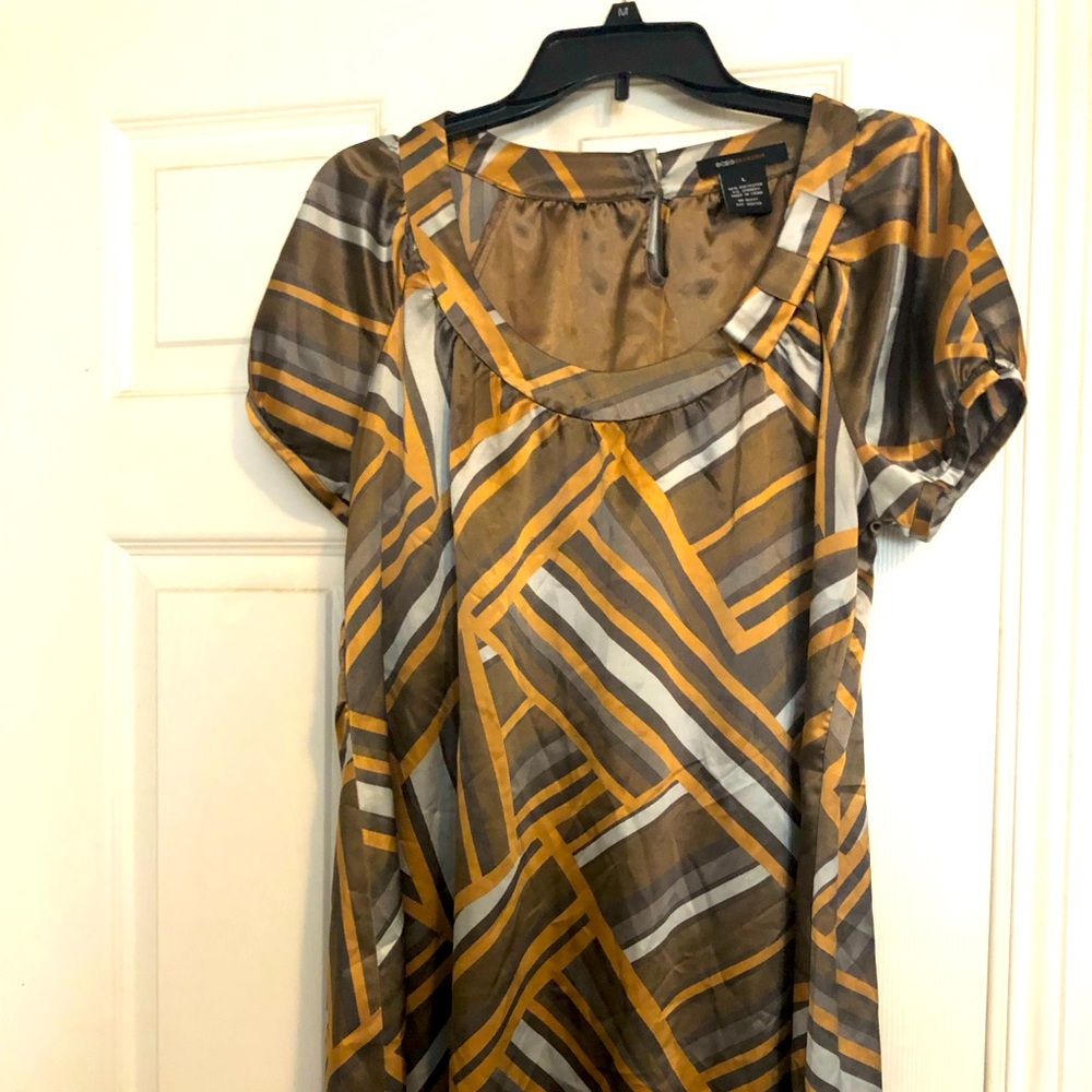 BCBGMAXAZRIA dress. Pretty round neckline with bow on the left side.